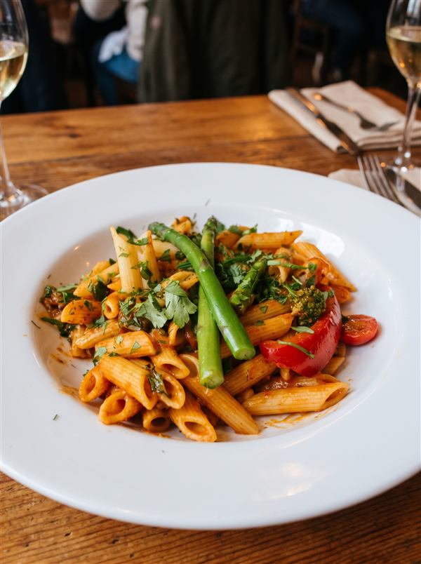 Penne Arrabbiata with asparagus, peppers and fresh herbs